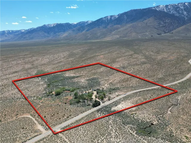 a view of a lake with mountain in the background