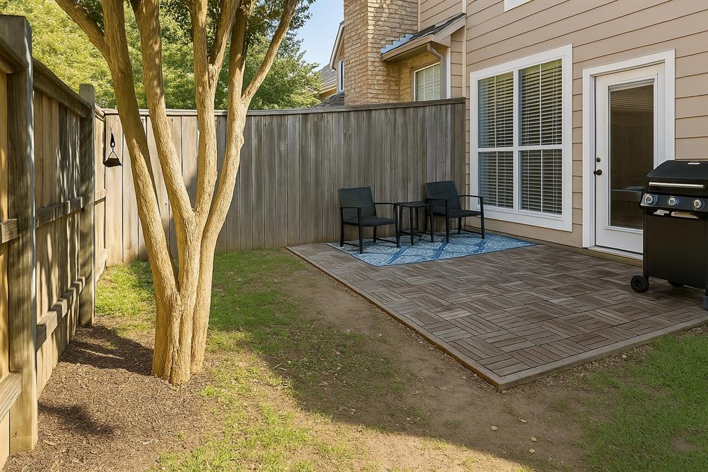 8557 Brittania Way Dallas, TX 75243 - Photo 12 of 18 Fenced backyard with area for grilling and a patio area