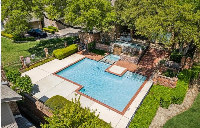 8557 Brittania Way Dallas, TX 75243 - Photo 14 of 18 View of pool with a patio area and an in-ground hot tub