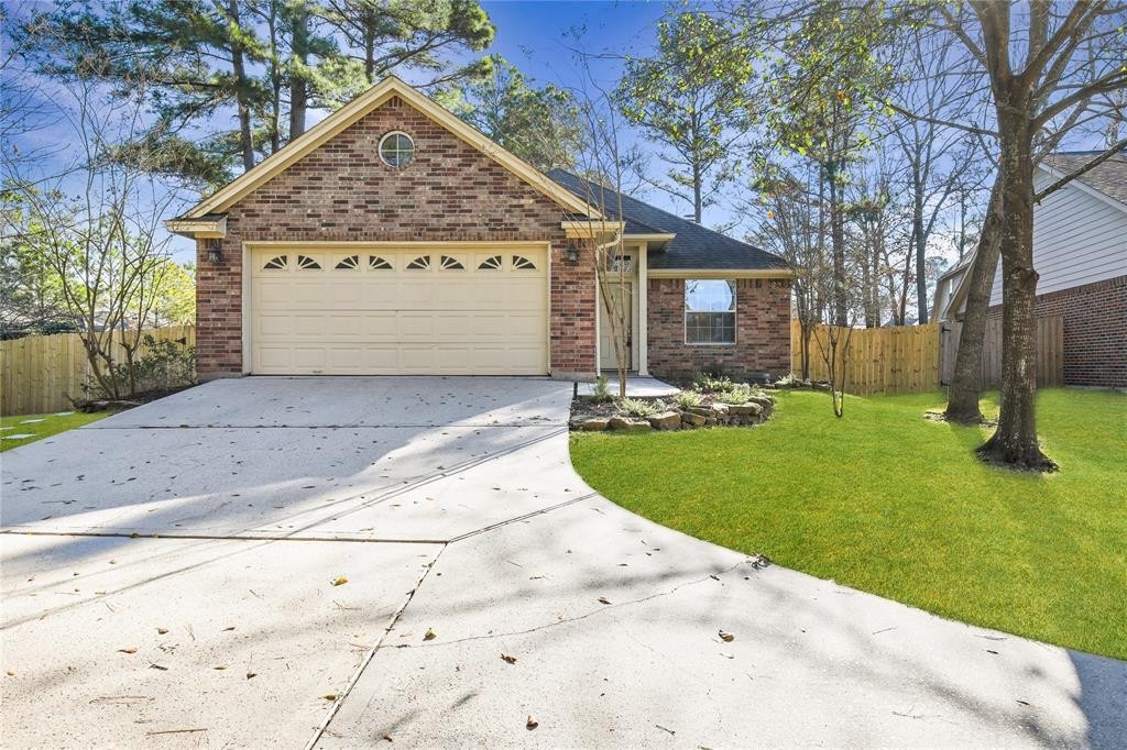 3818 Springcrest Lane Montgomery, TX 77356 - Photo 19 of 19 a view of a backyard of the house