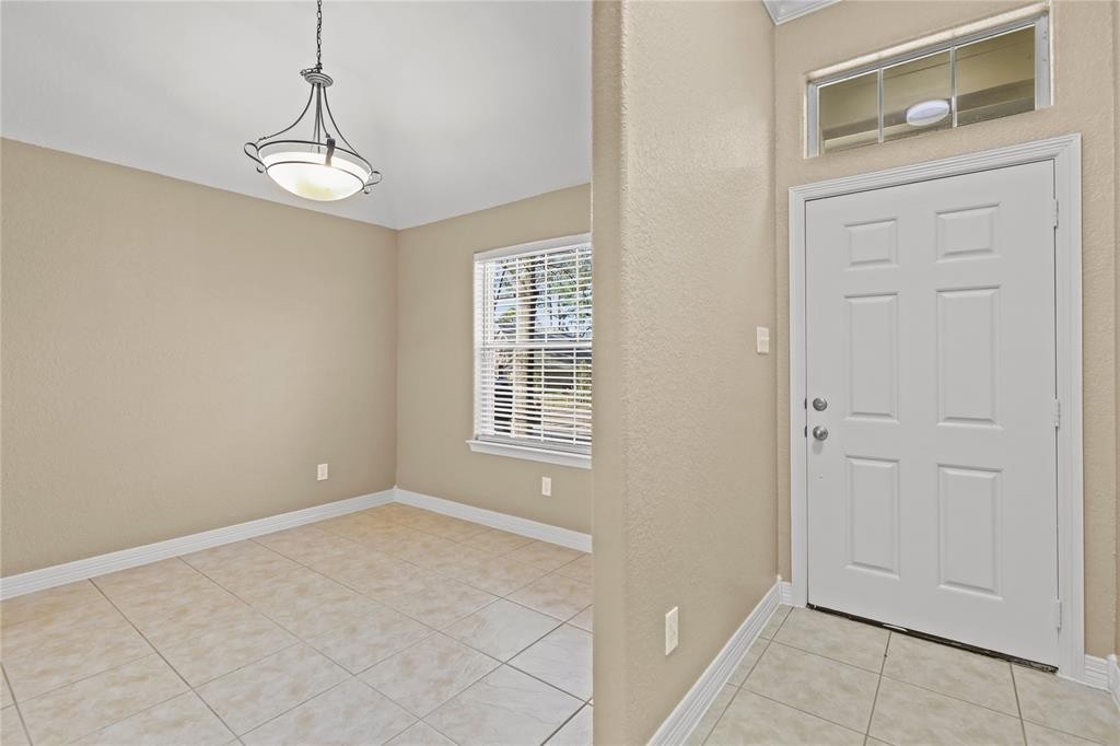 3818 Springcrest Lane Montgomery, TX 77356 - Photo 3 of 19 a view of an empty room with a window