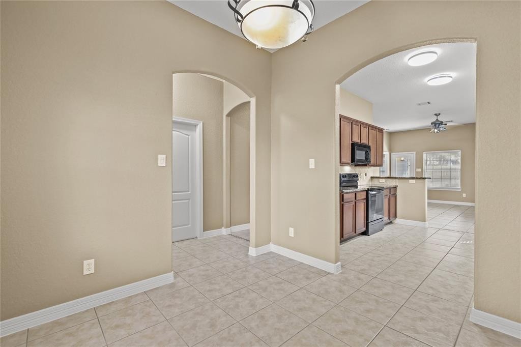 3818 Springcrest Lane Montgomery, TX 77356 - Photo 4 of 19 a view of kitchen with wooden floor