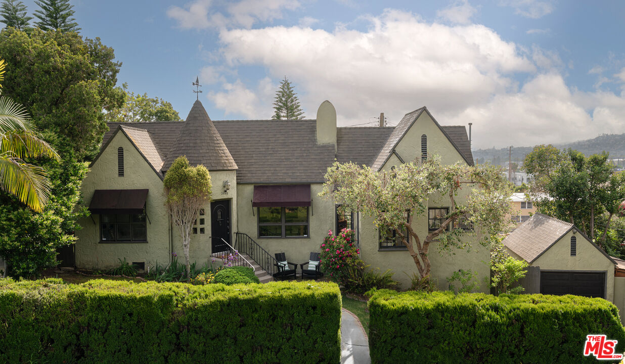 3640 Roderick Road Los Angeles, CA 90065 - Photo 1 of 27 a front view of house with yard and trees