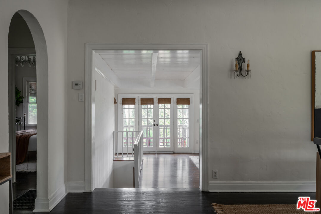 3640 Roderick Road Los Angeles, CA 90065 - Photo 13 of 27 a view of empty room with wooden floor and fan