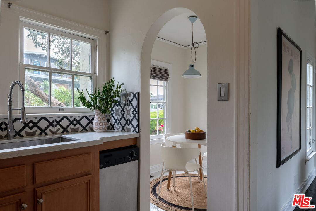 3640 Roderick Road Los Angeles, CA 90065 - Photo 15 of 27 a bathroom with a sink and a mirror