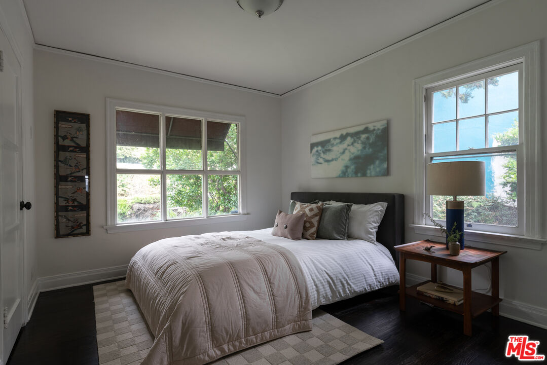 3640 Roderick Road Los Angeles, CA 90065 - Photo 18 of 27 a bedroom with a bed and a window
