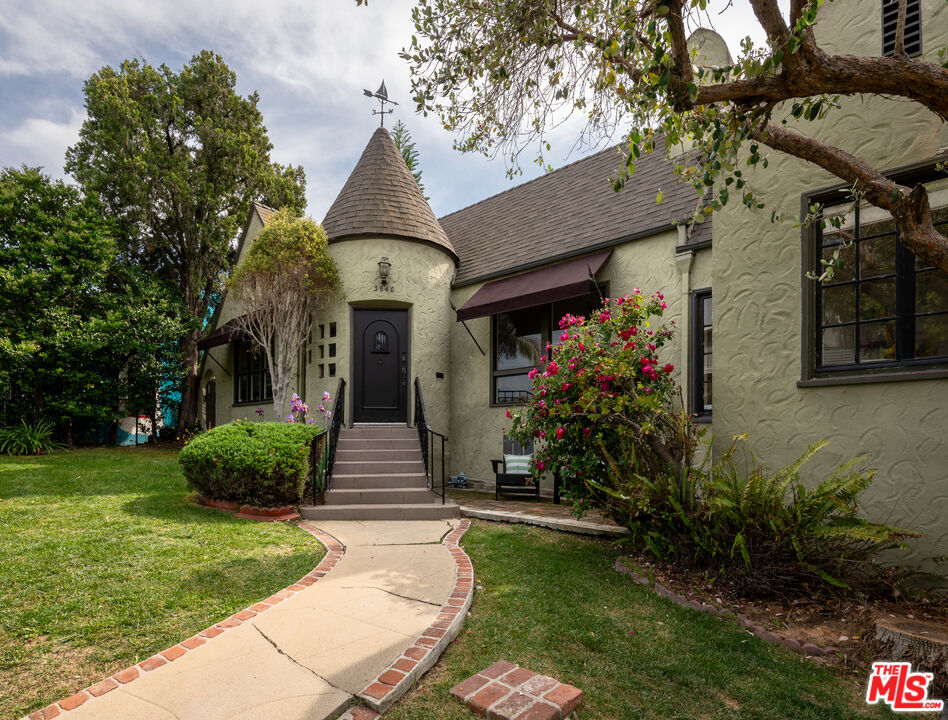 3640 Roderick Road Los Angeles, CA 90065 - Photo 26 of 27 a front view of a house with garden