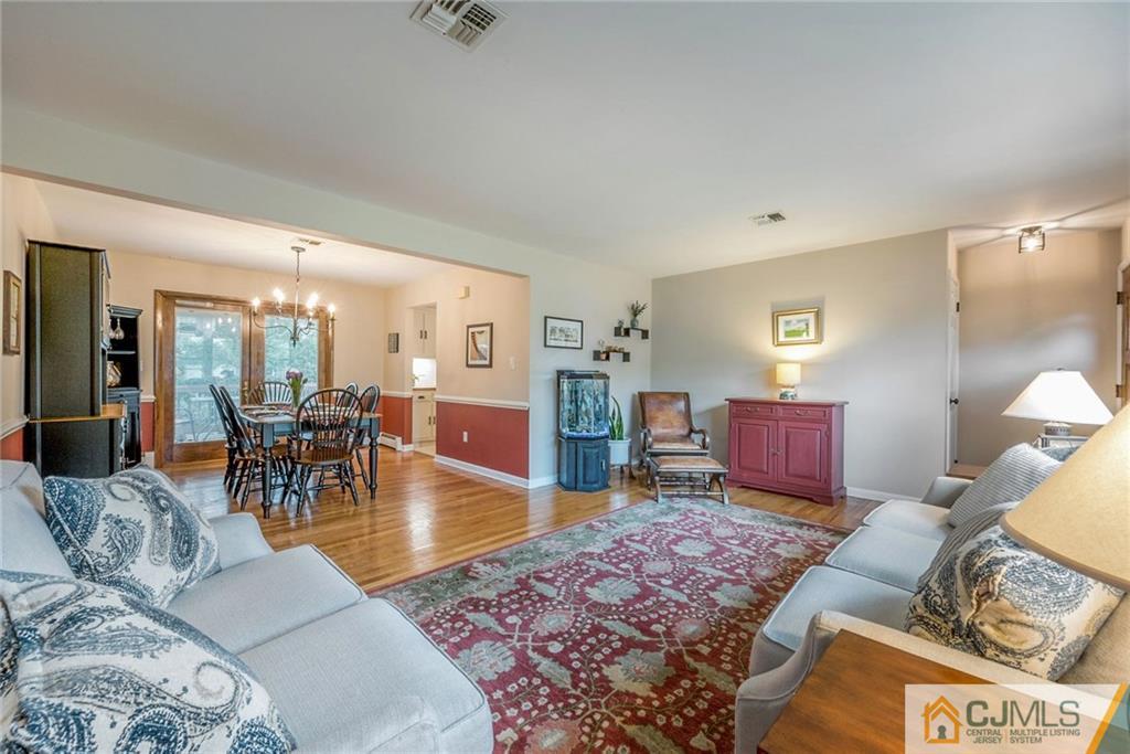 1 Ryan Road Cranbury, NJ 08512 - Photo 2 of 22 a living room with furniture and wooden floor