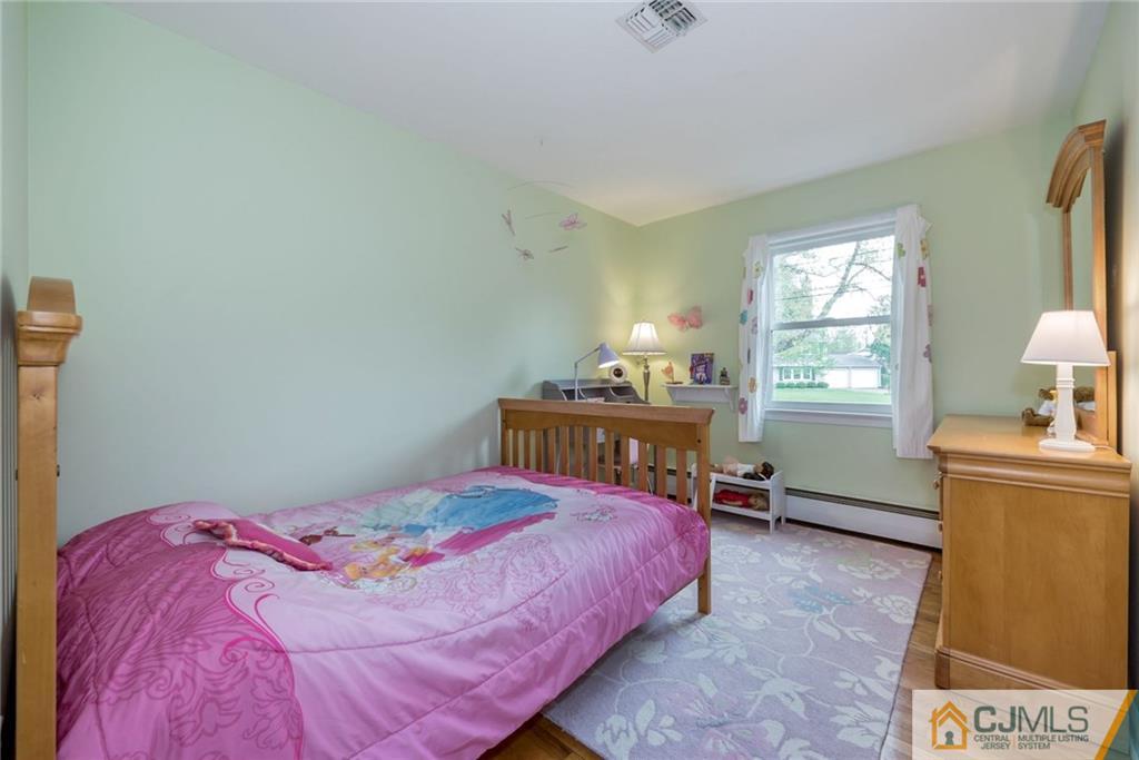 1 Ryan Road Cranbury, NJ 08512 - Photo 14 of 22 a bedroom with a bed and a window