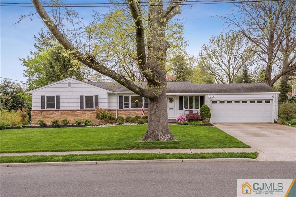 1 Ryan Road Cranbury, NJ 08512 - Photo 22 of 22 a front view of a house with a yard and garage