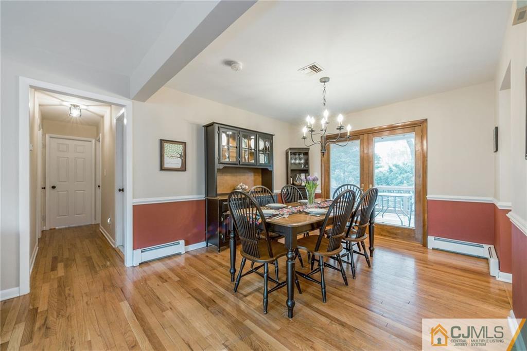 1 Ryan Road Cranbury, NJ 08512 - Photo 4 of 22 a view of a dining room with furniture window and wooden floor