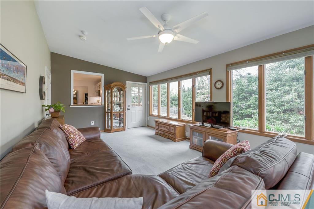 1 Ryan Road Cranbury, NJ 08512 - Photo 9 of 22 a living room with furniture and a large window