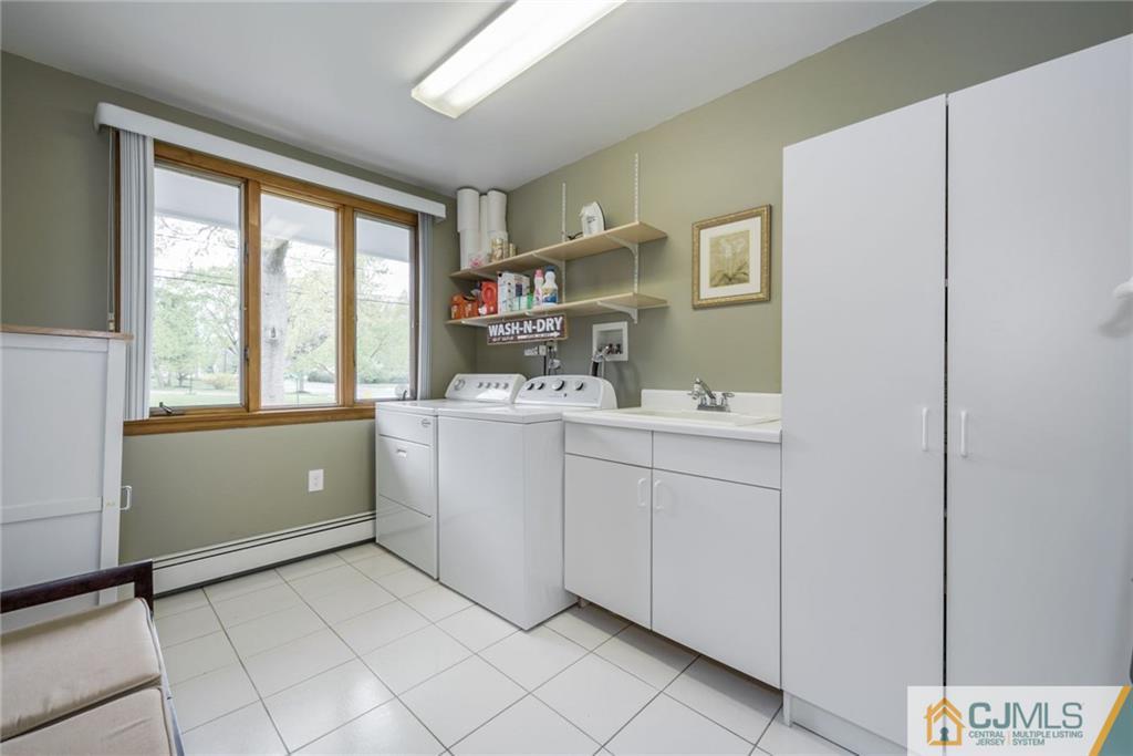 1 Ryan Road Cranbury, NJ 08512 - Photo 10 of 22 a room with a sink cabinets and a window