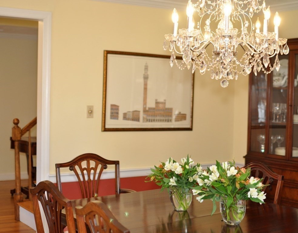 149 College Road Concord, MA 01742 - Photo 9 of 31 a vase of flowers sitting on a table