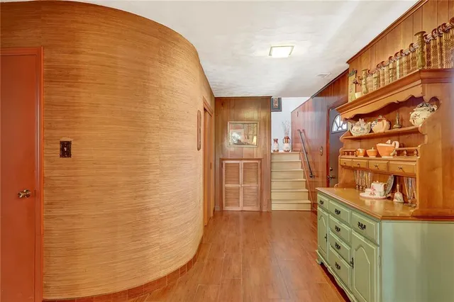 a bathroom with a shower and a sink