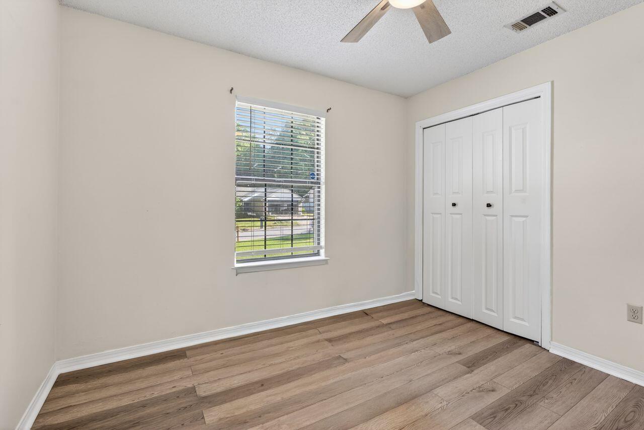 121 Campbell Street Crestview, FL 32536 - Photo 24 of 45 Bed 2 w/ fan, laminate wood floors