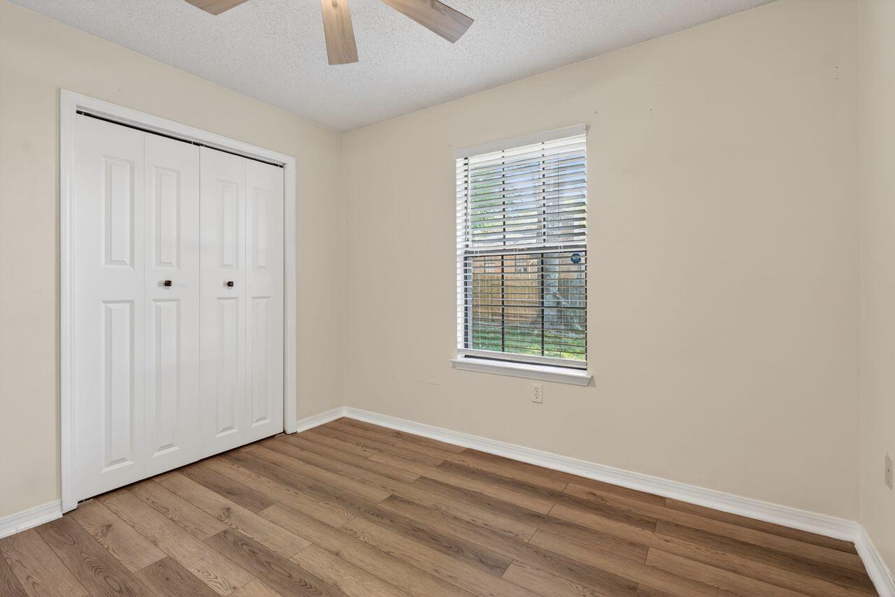 121 Campbell Street Crestview, FL 32536 - Photo 27 of 45 Bed 3 w/ fan, wood & laminate floors