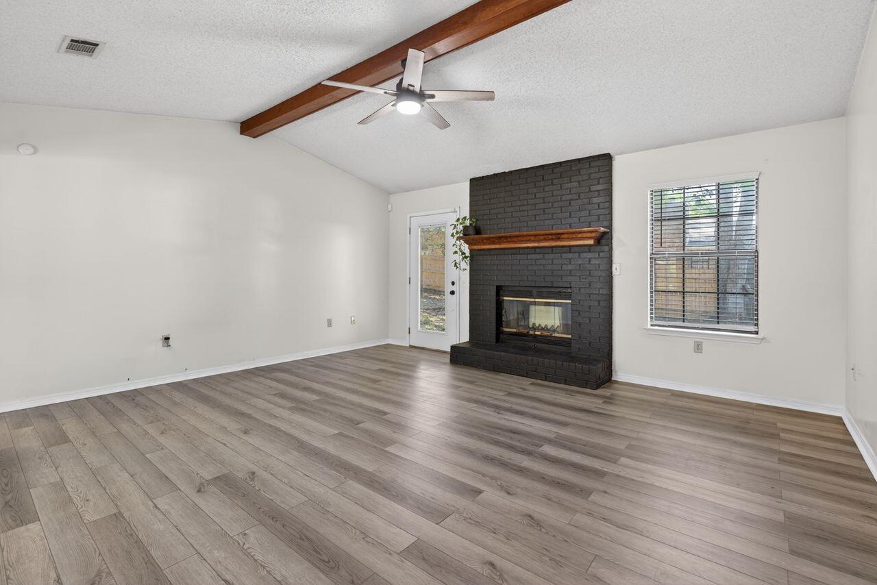 121 Campbell Street Crestview, FL 32536 - Photo 7 of 45 Wood Burning fireplace in living room