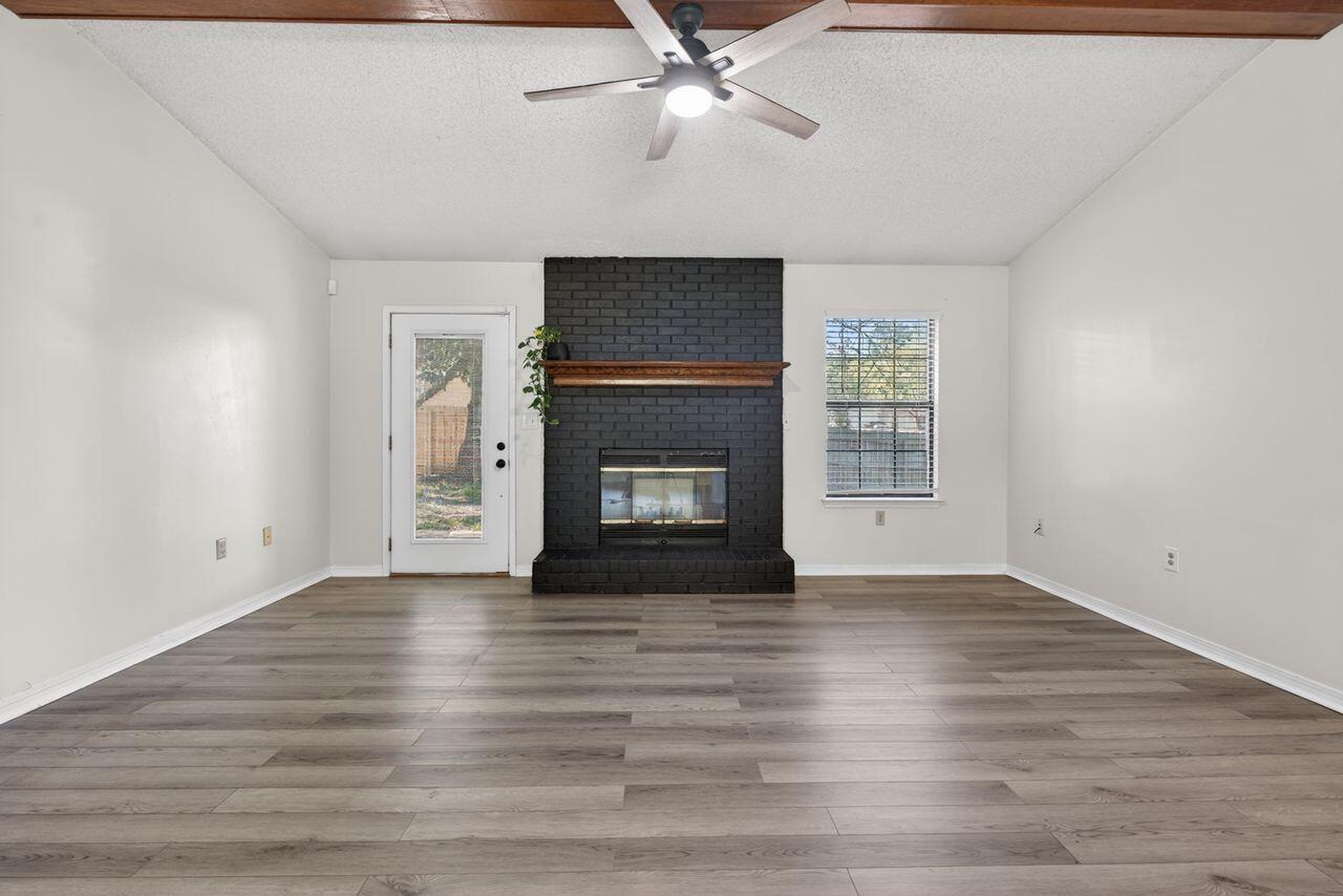 121 Campbell Street Crestview, FL 32536 - Photo 8 of 45 Spacious living with brick fireplace