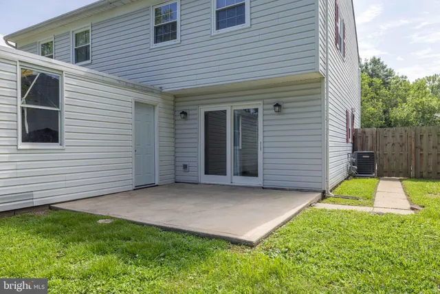 a bathroom with a sink a toilet and a bathtub
