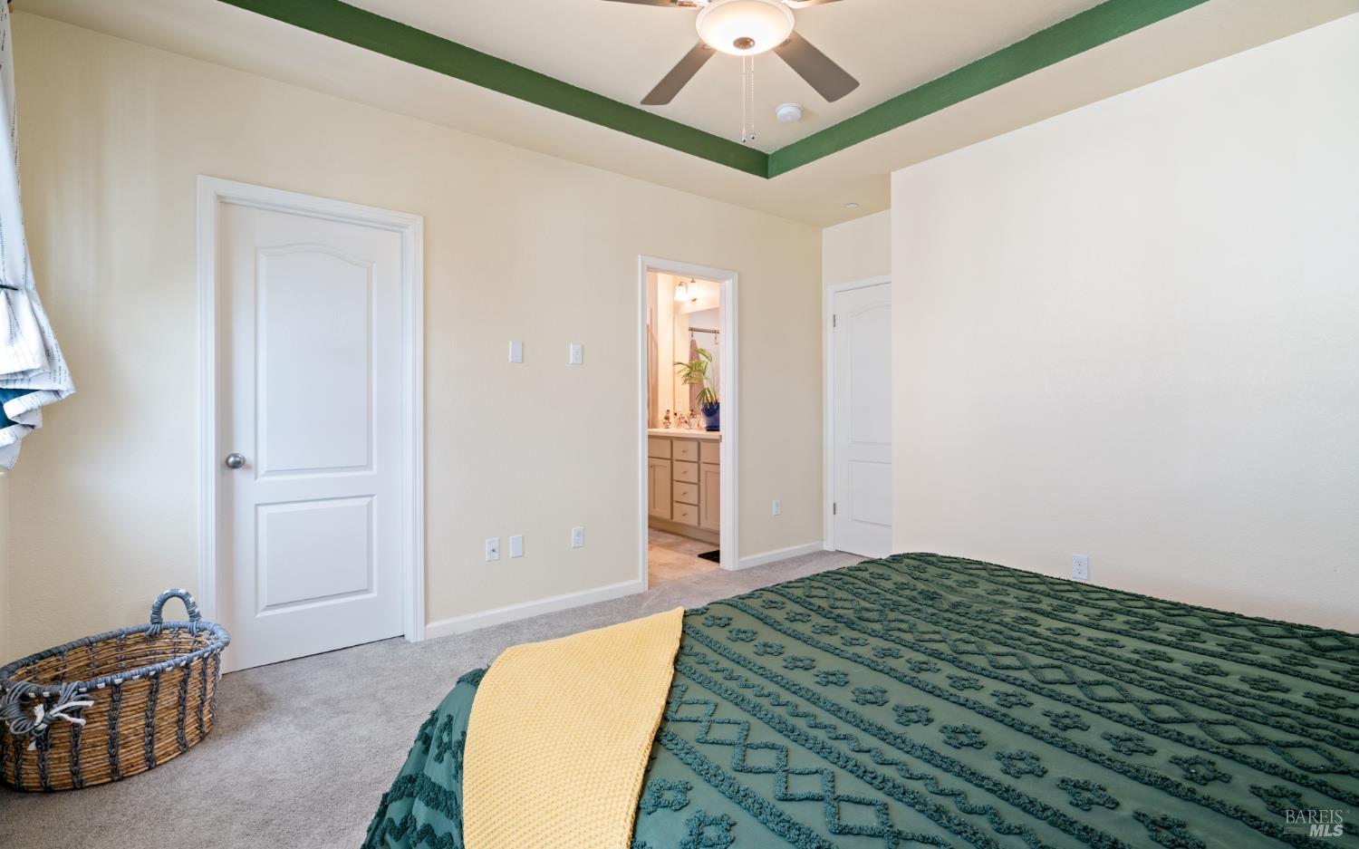 1461 Cecilia Drive Santa Rosa, CA 95401 - Photo 11 of 20 a bedroom with a bed and a chandelier