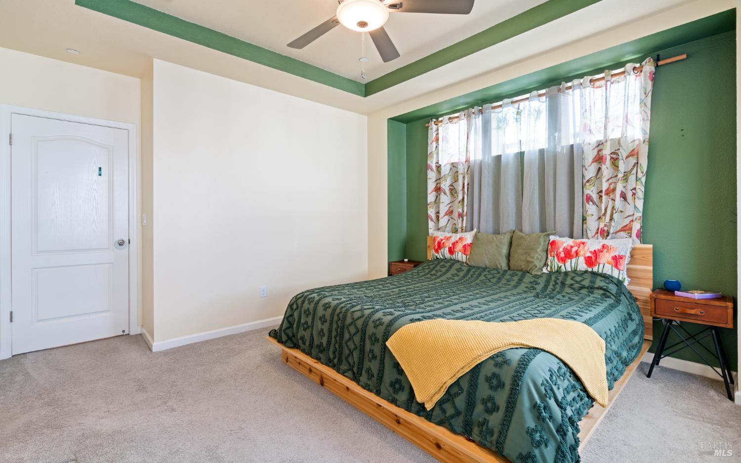 1461 Cecilia Drive Santa Rosa, CA 95401 - Photo 10 of 20 a bed sitting in a bedroom next to a window