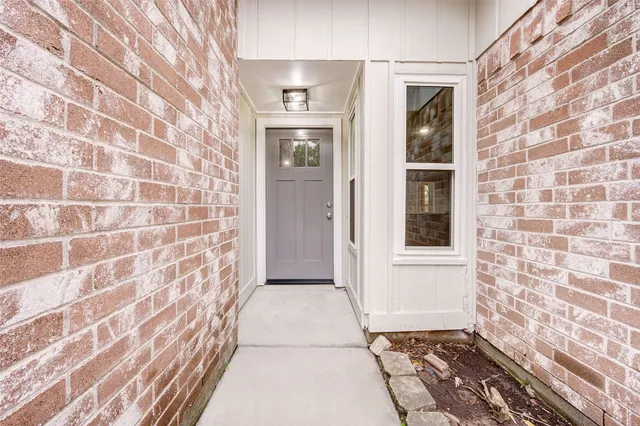 a view of a brick house with a sink