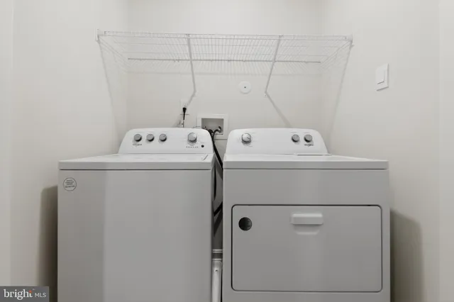 a view of a balcony with wooden floor