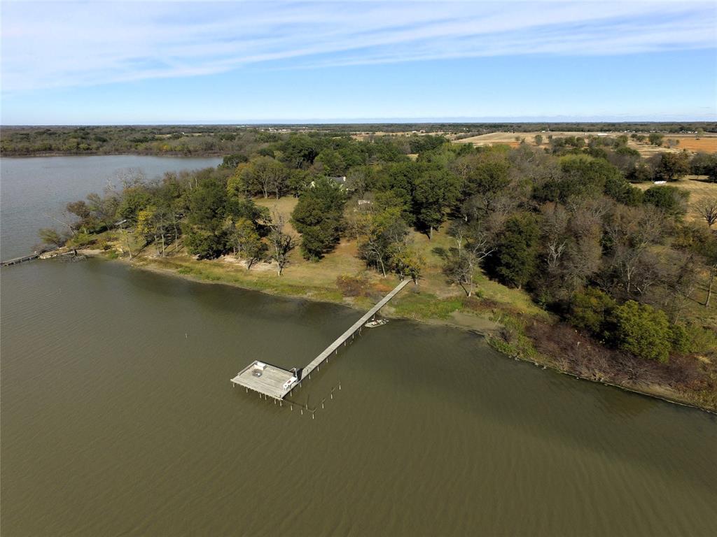 Tbd Callaway Lane Quinlan, TX 75474 - Photo 13 of 16 a view of a lake with a city