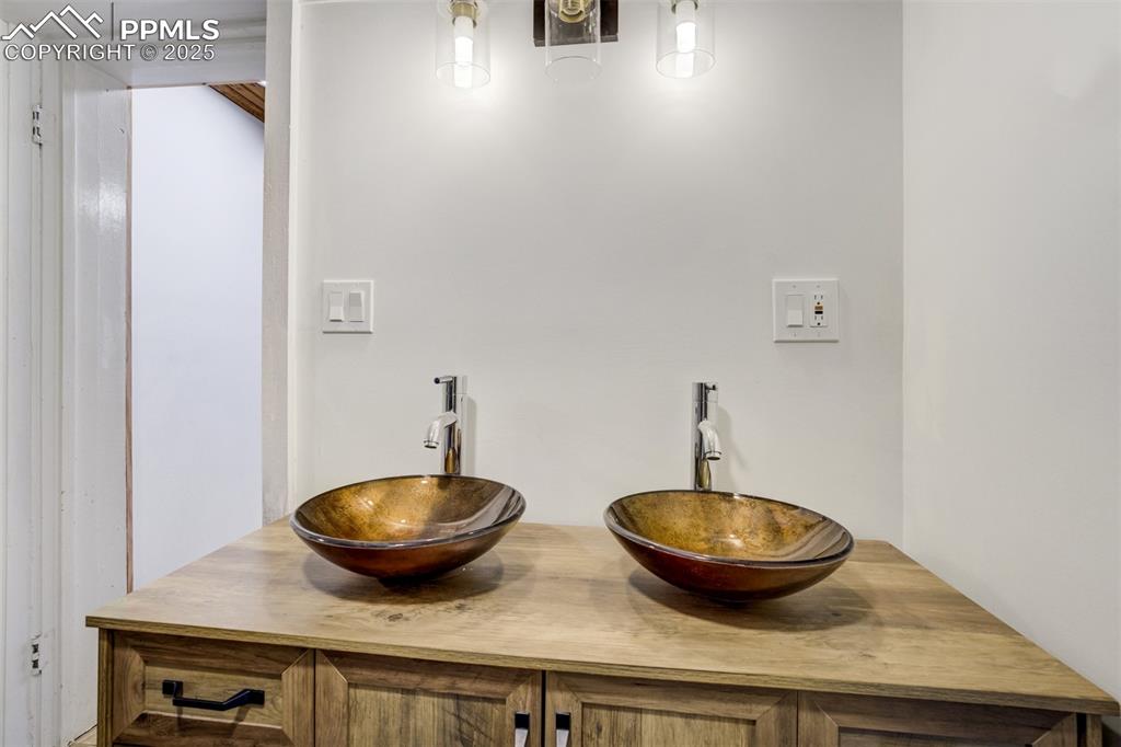 4560 Canonwood Road Colorado Springs, CO 80906 - Photo 22 of 50 a view of a livingroom and a table