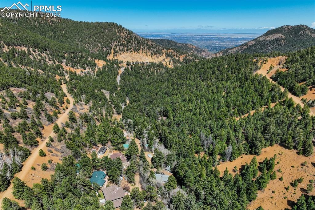 4560 Canonwood Road Colorado Springs, CO 80906 - Photo 43 of 50 a view of a houses with a yard