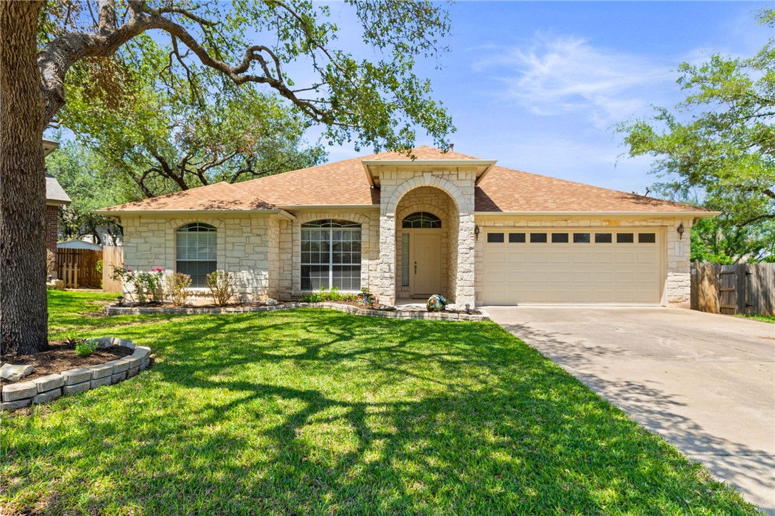 2407 Corbin Way Cedar Park, TX 78613 - Photo 1 of 1 a front view of a house with yard patio and green space