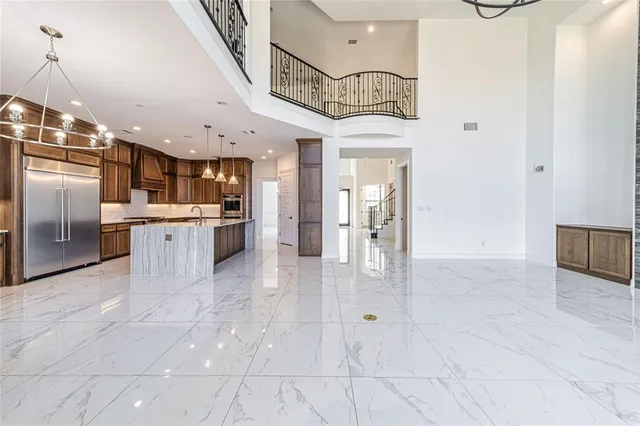 a spacious bathroom with a bathtub and a sink