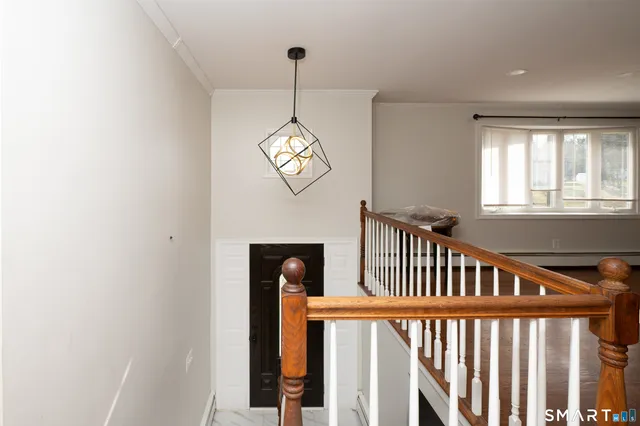 a view of hallway with windows
