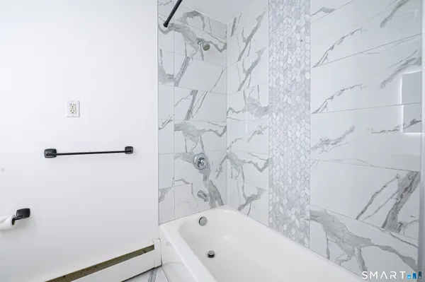 a bathroom with a bathtub