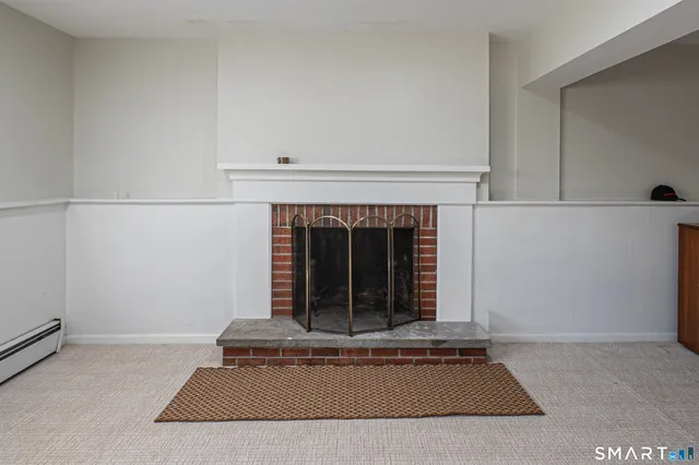 a living room with a fireplace