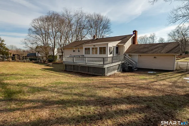 a house view with a backyard space