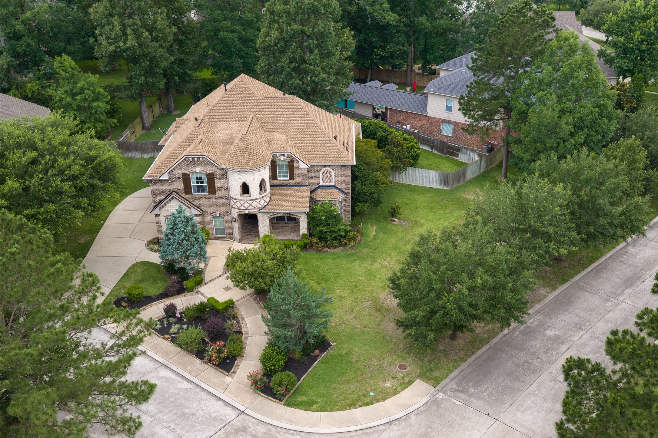 2115 Graystone Ridge Drive Conroe, TX 77304 - Photo 46 of 47 Beautiful corner lot located in Graystone Hills, offering enhanced curb appeal, added space, and a desirable setting in one of the area's sought-after neighborhoods.
