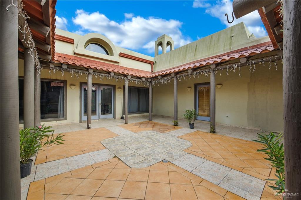 2701 Easy Street Edinburg, TX 78539 - Photo 18 of 22 a front view of a building with a outdoor space