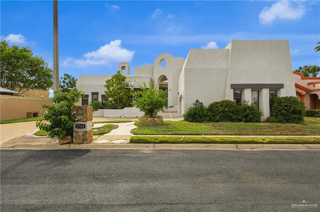 2701 Easy Street Edinburg, TX 78539 - Photo 2 of 22 a view of a house with a big yard and a large tree