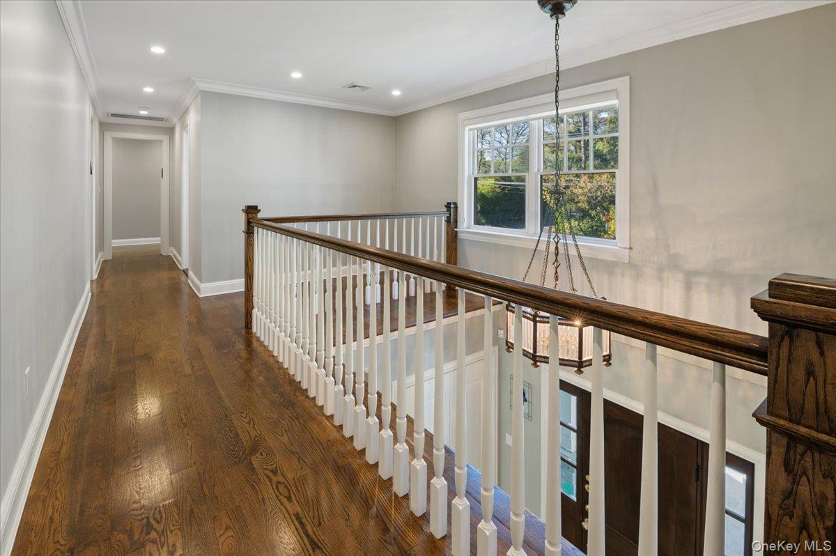 205 Hewlett Neck Road Woodmere, NY 11598 - Photo 25 of 50 a view of entryway with wooden floor