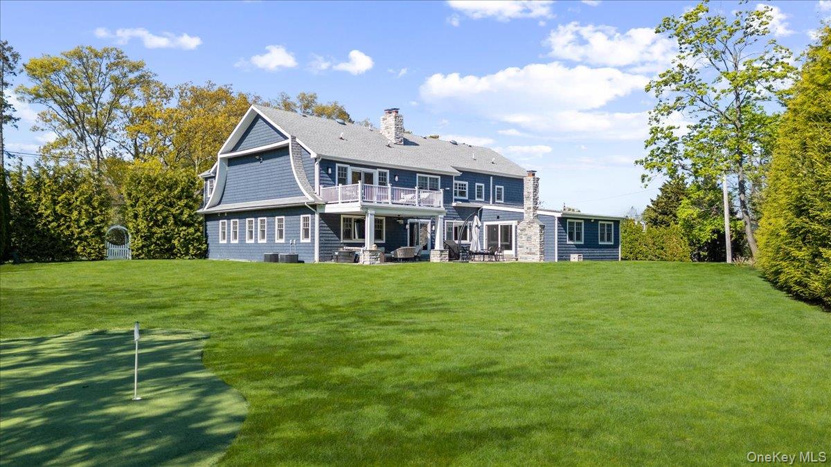 205 Hewlett Neck Road Woodmere, NY 11598 - Photo 46 of 50 a house view with a garden space