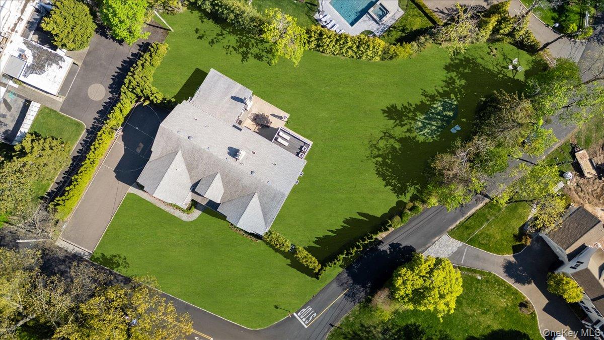 205 Hewlett Neck Road Woodmere, NY 11598 - Photo 49 of 50 an aerial view of a house