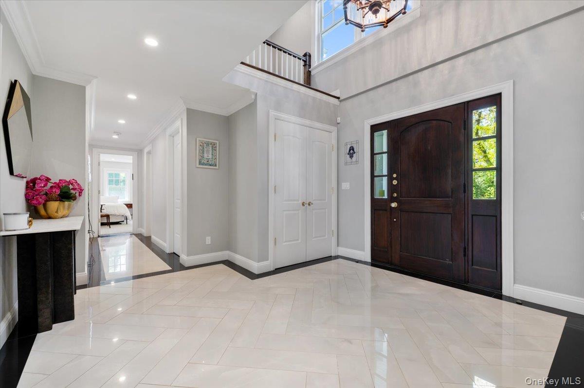 205 Hewlett Neck Road Woodmere, NY 11598 - Photo 5 of 50 a view of livingroom with hallway and dresser