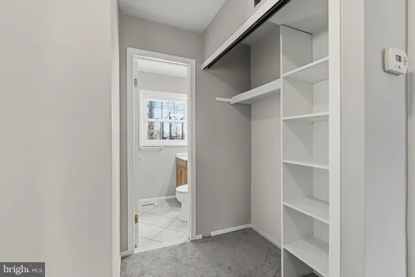 a view of a bathroom with toilet