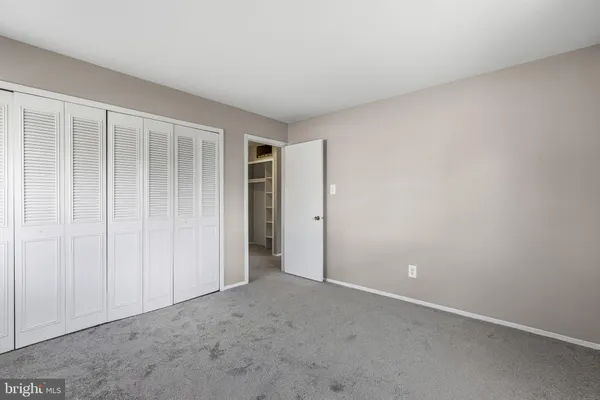 an empty room with closet