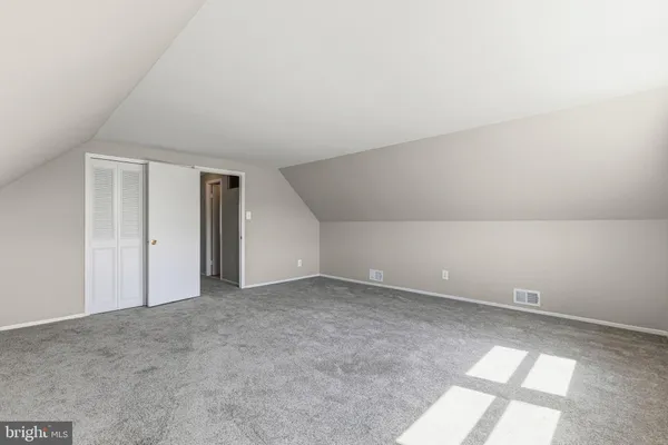 an empty room with a natural light