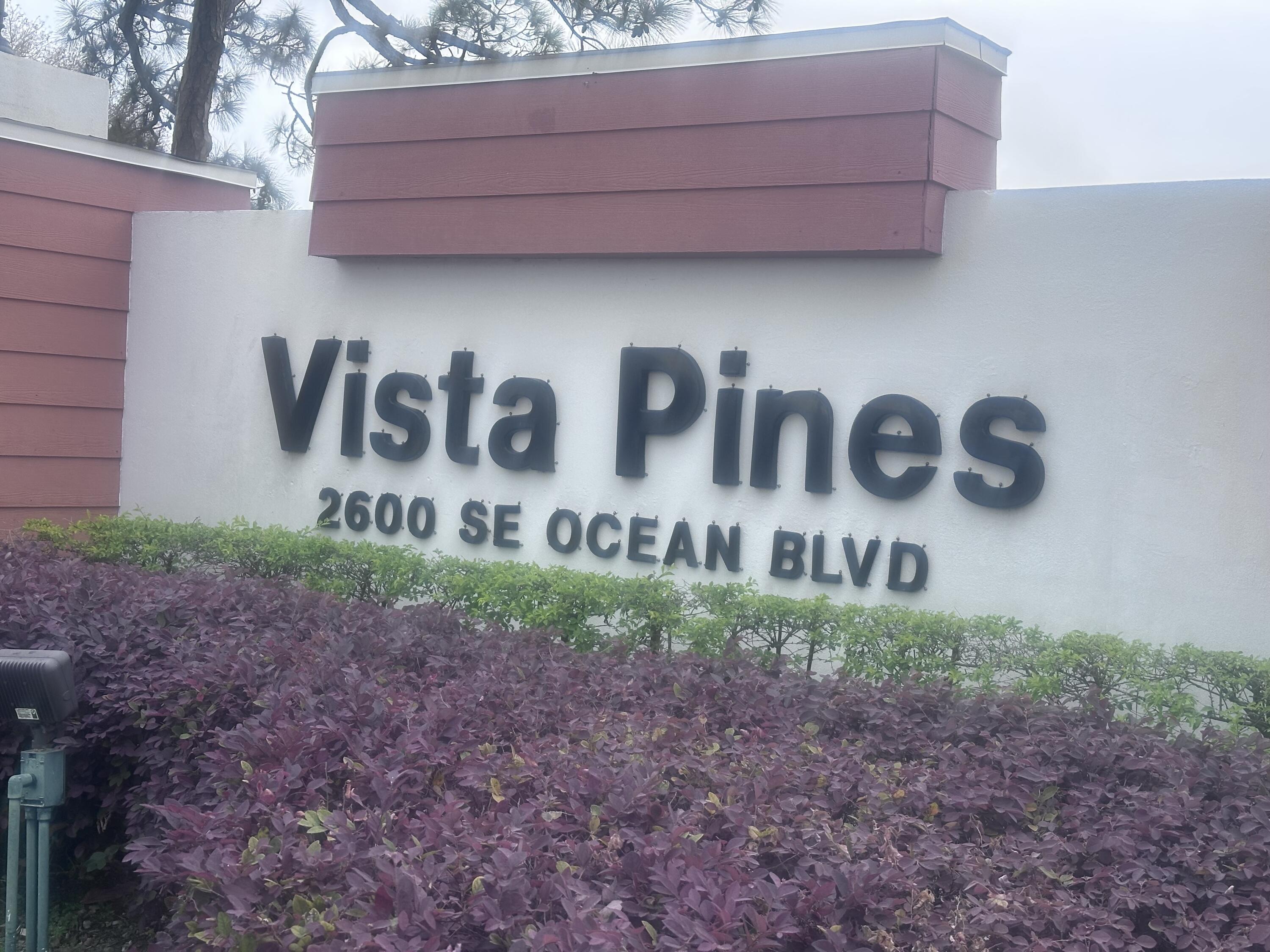 2600 Southeast Ocean Boulevard, Unit D12 Stuart, FL 34996 - Photo 1 of 15 a view of outdoor space with sign board