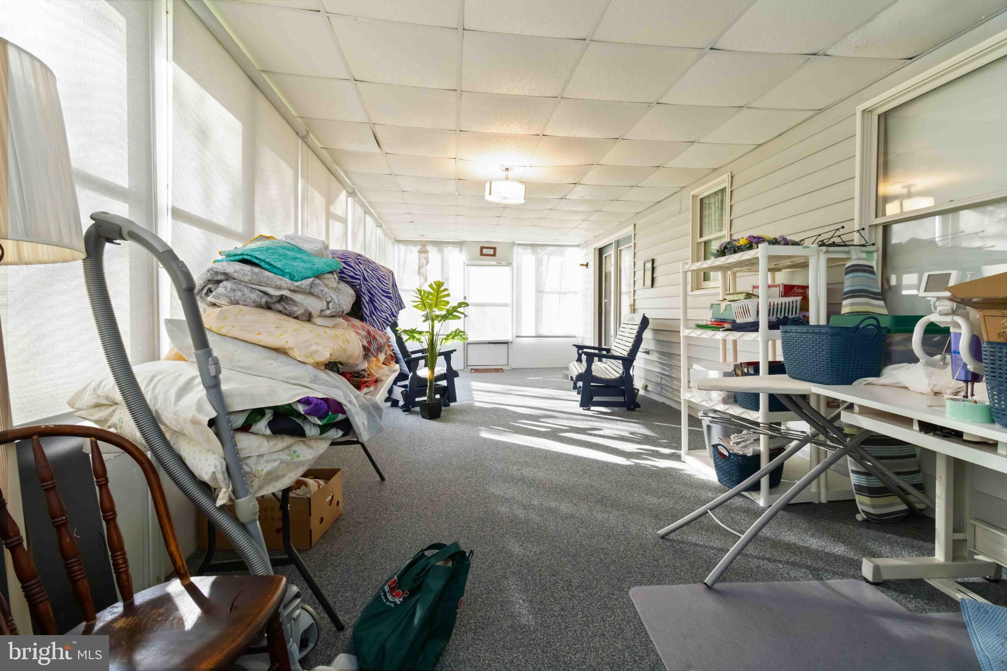 1712 Newville Road Carlisle, PA 17015 - Photo 12 of 32 a view of a livingroom with workspace and a window