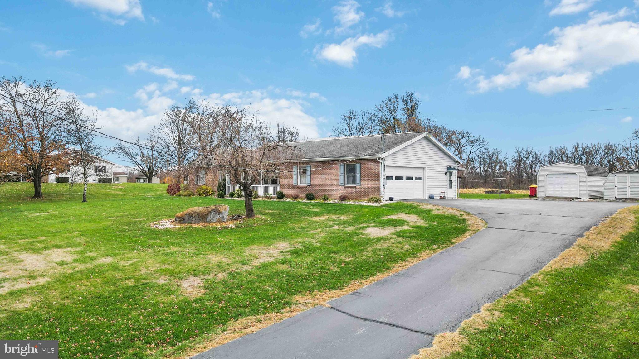 1712 Newville Road Carlisle, PA 17015 - Photo 31 of 32 a view of a house with a yard